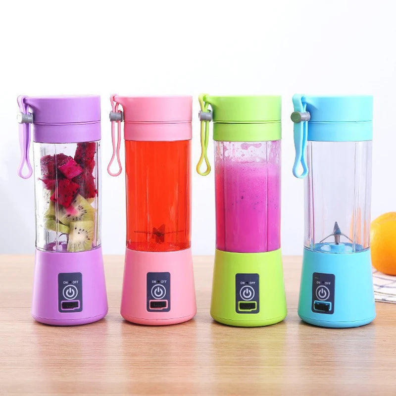 Mini liquidificador portátil JuicyGo rosa cheio de frutas coloridas pronto para bater smoothies saudáveis

